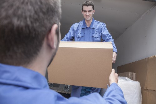 Professional movers loading a truck in Wales