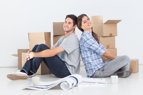 Team member securing furniture during a house removal in Wales