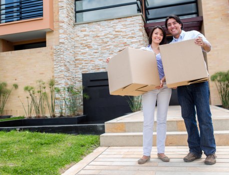 Happy clients after a successful move with Wales Removals